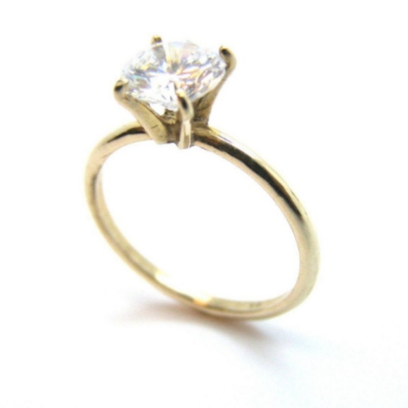 RingSolitaireWith Clear Stone 10k Yellow Gold